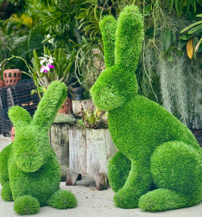 Rabbit topiary sculpture handcrafted in artificial grass by Palatial Topiary, styled in a luxury garden