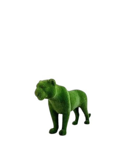 Ember, a life-size tiger topiary sculpture in artificial grass, shown in a poised stance as part of the Majestic Collection.