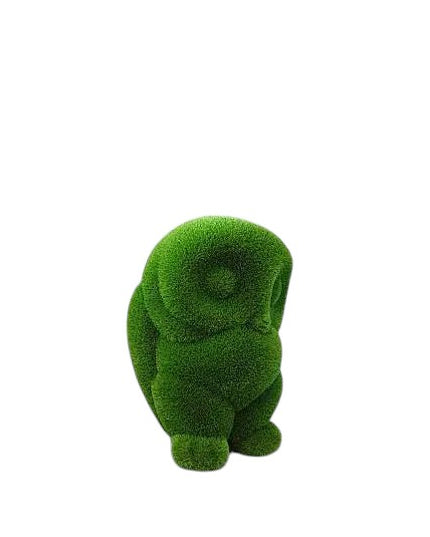 Lumen, a baby owl topiary sculpture in artificial grass, crafted as a delicate companion piece in the Celestial Collection.