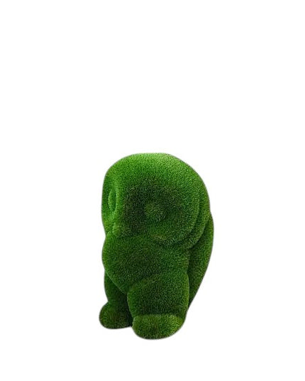 Lumen, a baby owl topiary sculpture in artificial grass, crafted as a delicate companion piece in the Celestial Collection.