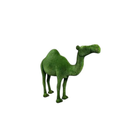 Voyager, a one-hump camel topiary sculpture in artificial grass, posed in motion for the Journey Collection.