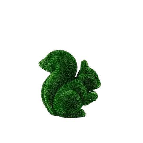 Wisp, a life-size squirrel topiary sculpture in artificial grass, posed in a moment of still curiosity from the Grace Collection.