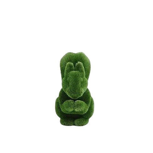 Wisp, a life-size squirrel topiary sculpture in artificial grass, posed in a moment of still curiosity from the Grace Collection.