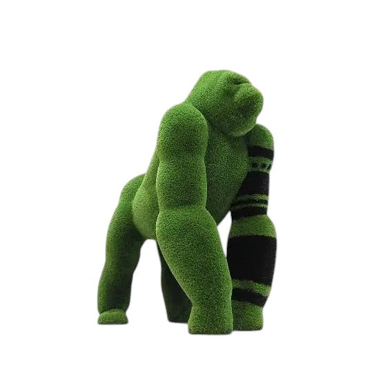 Oba, a life-size gorilla topiary sculpture in artificial grass, posed on all fours with tribal markings and a raised head from the Majestic Collection.