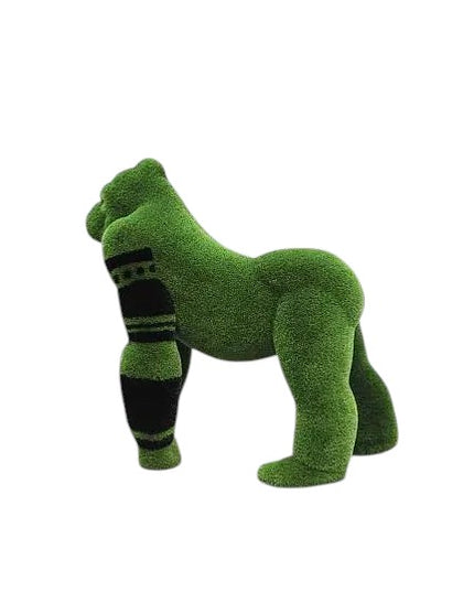 Oba, a life-size gorilla topiary sculpture in artificial grass, posed on all fours with tribal markings and a raised head from the Majestic Collection.