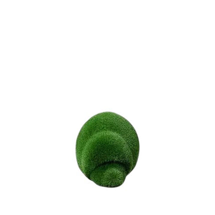 Thistle, a life-size hedgehog topiary sculpture in artificial grass, posed in a rounded, grounded form from the Grace Collection.