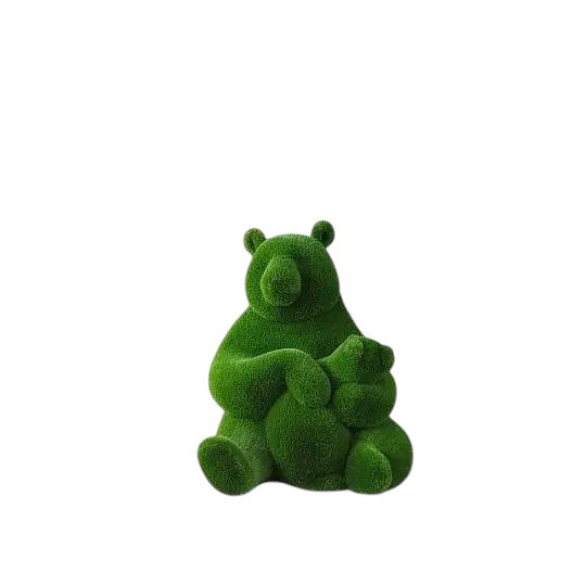 Lian, a life-size panda topiary sculpture in artificial grass, shown holding her cub in a sculptural embrace from the Grace Collection