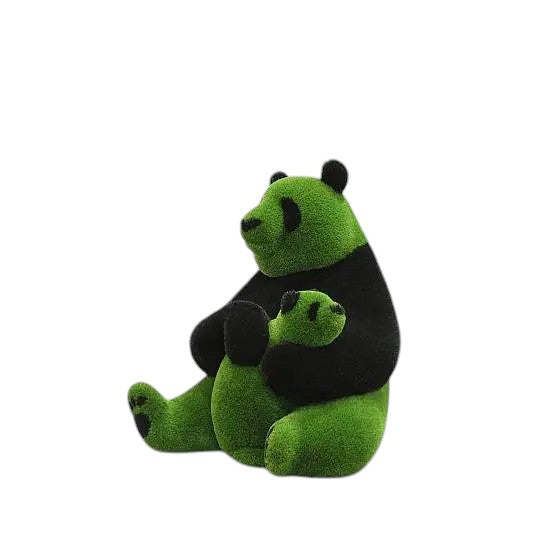 Lian, a life-size panda topiary sculpture in artificial grass, shown holding her cub in a sculptural embrace from the Grace Collection