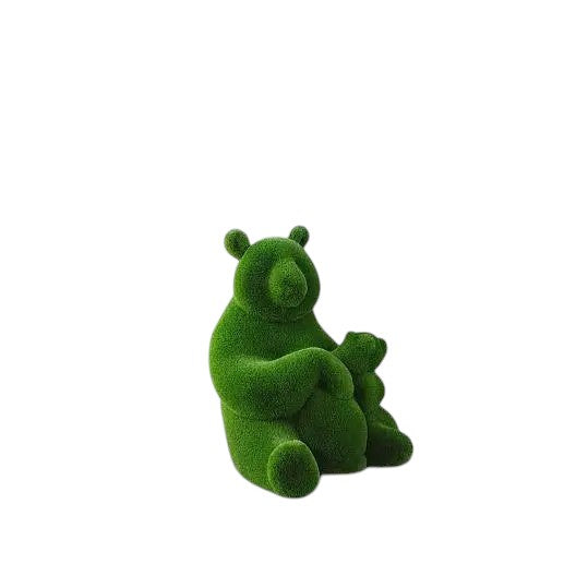 Lian, a life-size panda topiary sculpture in artificial grass, shown holding her cub in a sculptural embrace from the Grace Collection