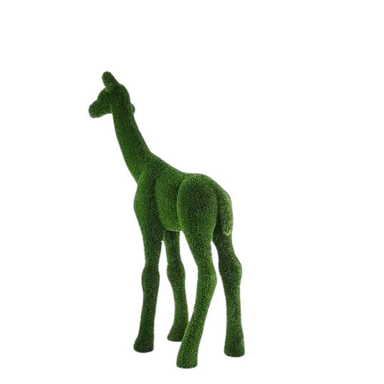 Small giraffe topiary sculpture in artificial grass.