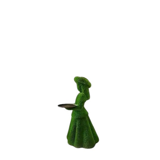 Topiary sculpture of girl in summer hat holding a serving tray, made of artificial grass

