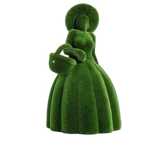 Topiary sculpture of elegant lady in full-brim hat and long dress, holding a basket under her arm

