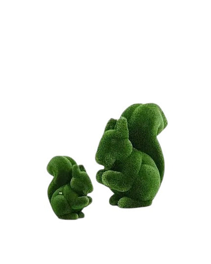  life-size squirrel topiary sculpture in artificial grass, posed in a moment of still curiosity from the Grace Collection.