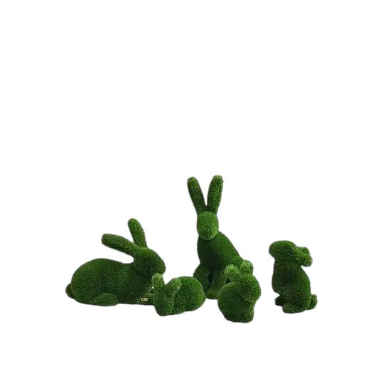 A family of rabbits -  topiary sculptures in artificial grass, from the Grace Collection.