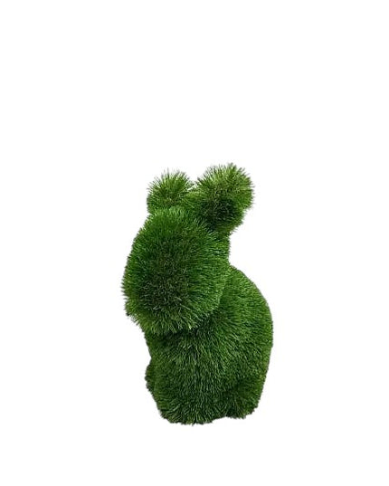 Fern, a baby rabbit topiary sculpture in artificial grass, seated with quiet poise from the Grace Collection.