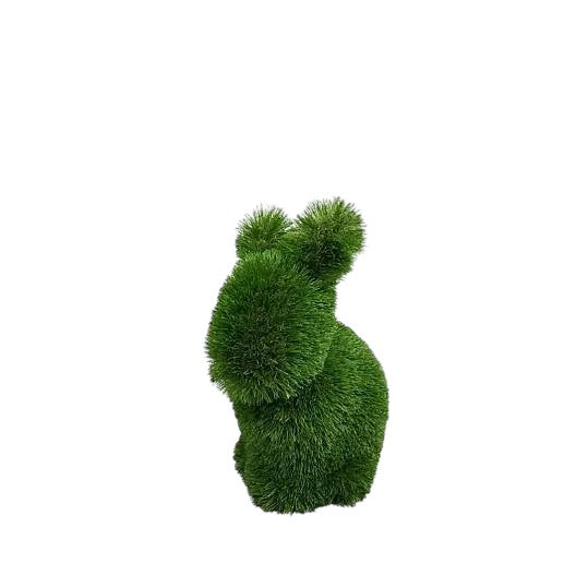 Fern, a baby rabbit topiary sculpture in artificial grass, seated with quiet poise from the Grace Collection.