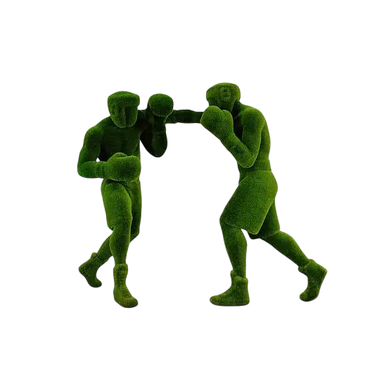 Boxer topiary sculptures in dynamic fighting motion, handcrafted in artificial grass


