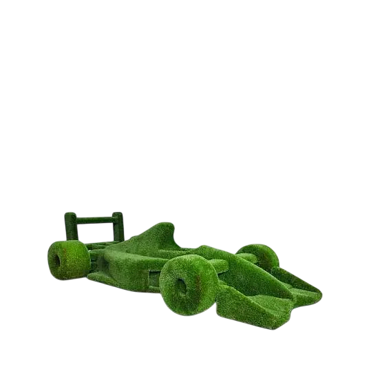 Life-size F1 car sculpture wrapped in artificial grass, designed as a botanical performance piece

