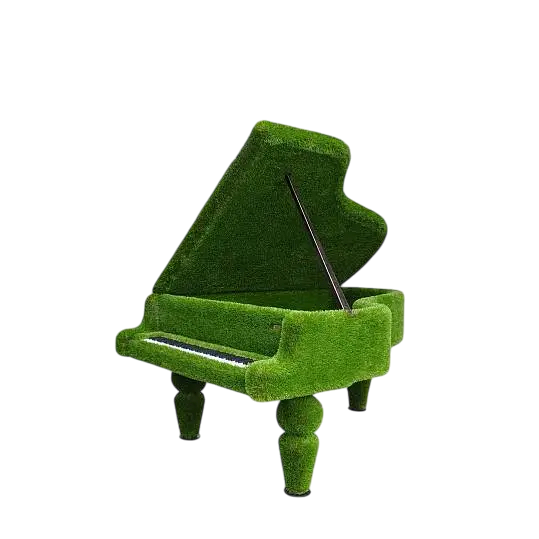 Sculptural grand piano wrapped in artificial grass, designed as a luxury statement piece

