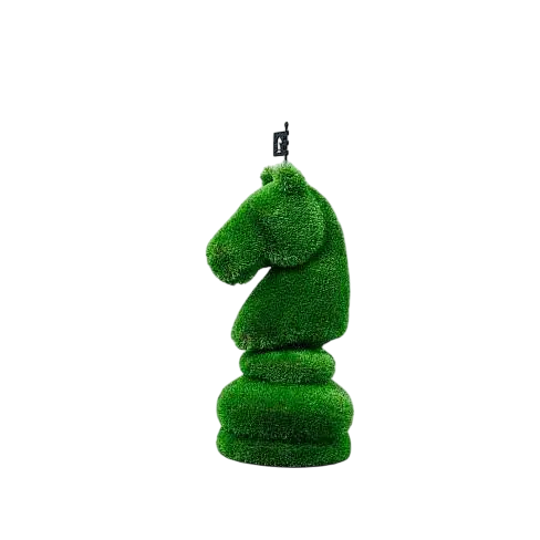 Oversized topiary chess sculptures made of artificial grass, including individual bishop piece.

