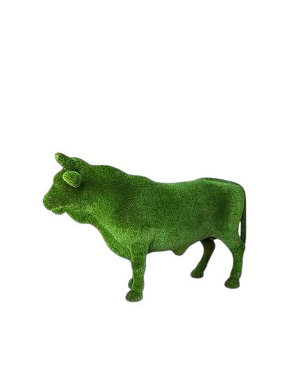 Steadfast, a life-size Black Angus bull topiary sculpture in artificial grass, standing in a broad and grounded posture from the Heritage Collection.