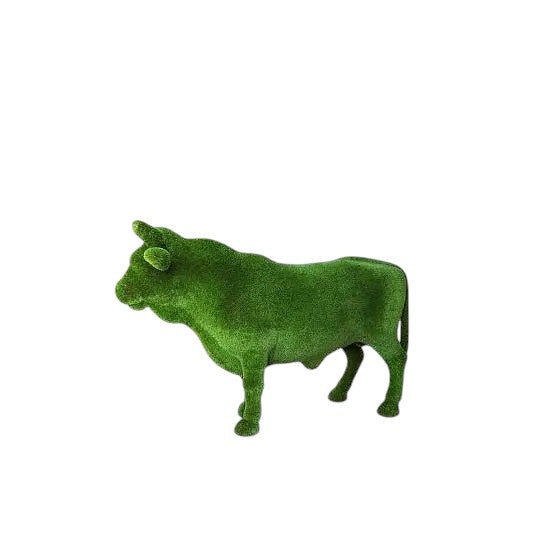 Steadfast, a life-size Black Angus bull topiary sculpture in artificial grass, standing in a broad and grounded posture from the Heritage Collection.