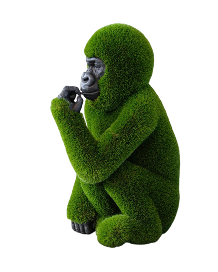 Taji – baby gorilla sculpture in artificial grass from the Journey Collection