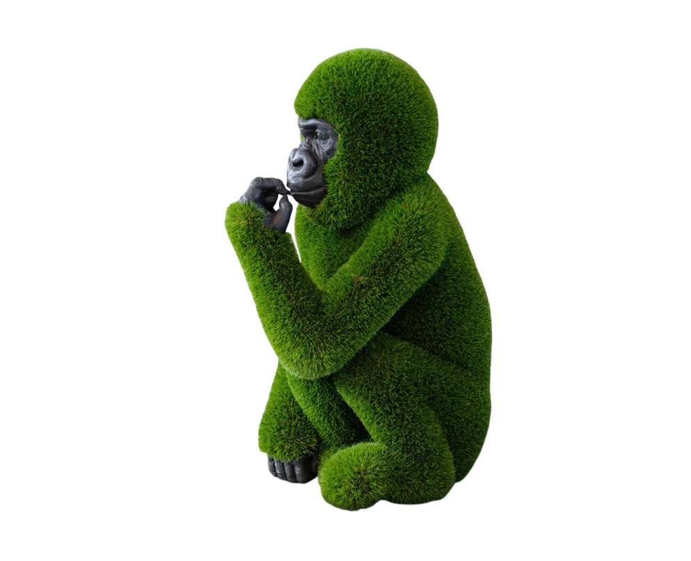Taji – baby gorilla sculpture in artificial grass from the Journey Collection